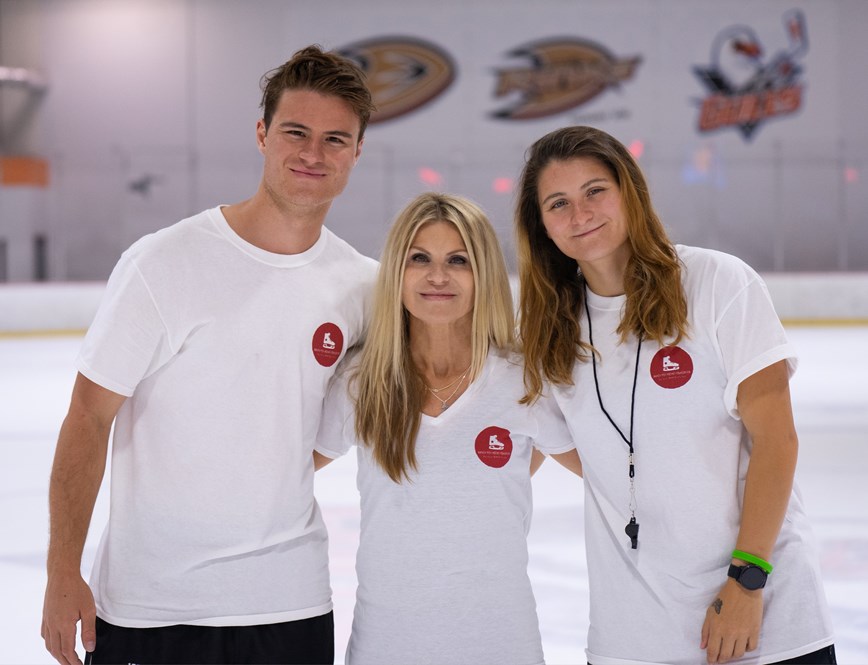 Susanna Moy, flanked by her children Tyler and Keely, created a foundation and hockey camp to honor the legacy of her late husband Randy, a longtime Southern California hockey coach.